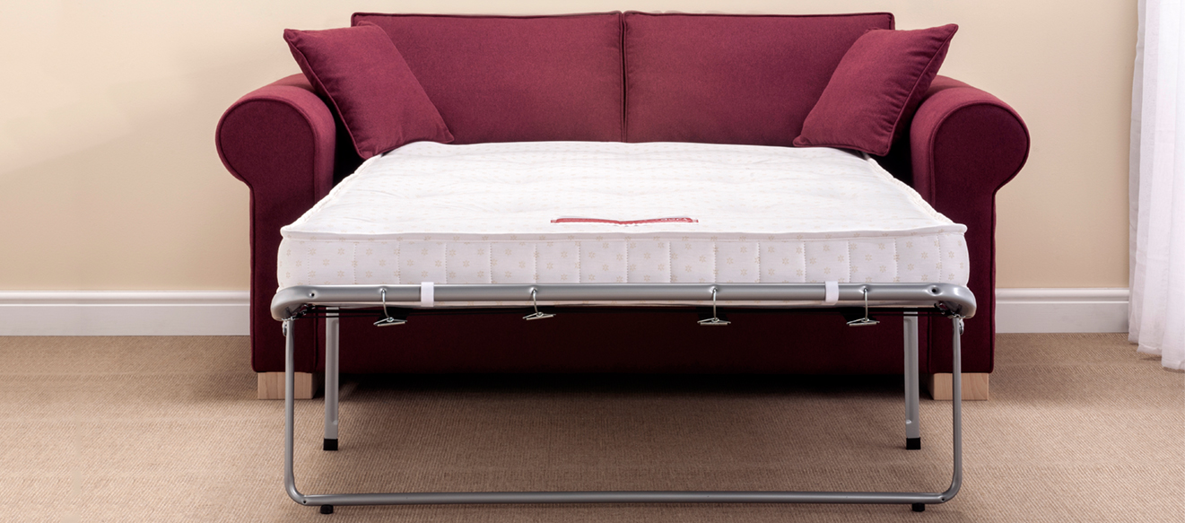 Cedar sofa bed upholstered in Proposta Aubergine